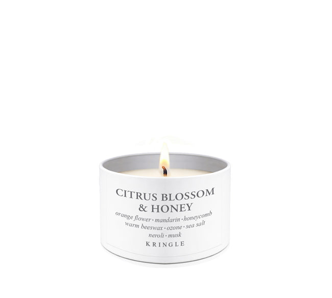 Kringle Candle with 'Citrus Blossom & Honey' fragrance on a white background