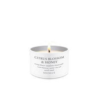 Kringle Candle with 'Citrus Blossom & Honey' fragrance on a white background
