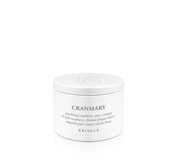 A white metal candle tin of Cranmary by Kringle Candle, featuring a clean white label with black text and a matching white lid, set against a seamless white background.