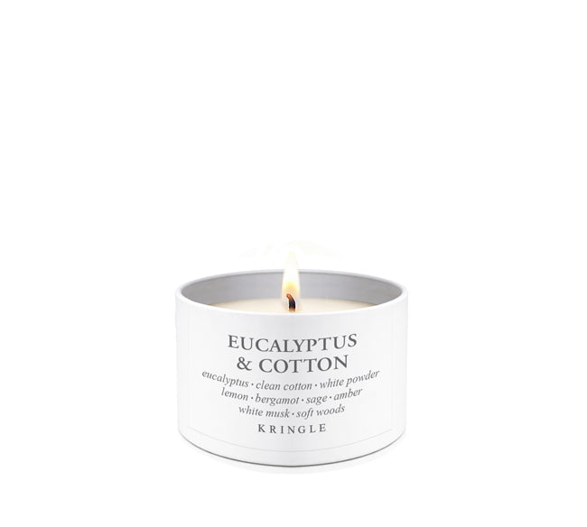 Candle tin with 'Eucalyptus & Cotton' fragrance on a white background
