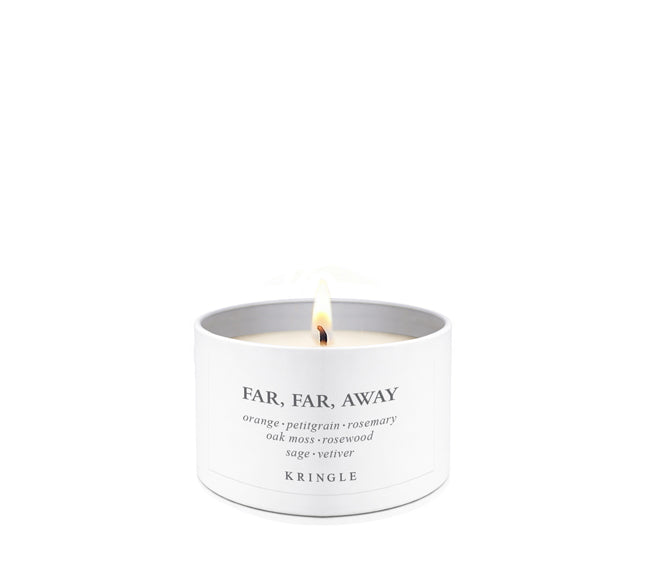 Far, Far Away Fragrance in a White Mini Candle Tin single-wick lit by Kringle Candle
