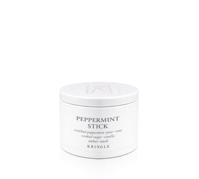 A white cylindrical jar of Kringle Peppermint Stick ampoe mask with black text on a clean white background.