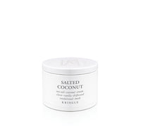 Kringle Candle tin labeled 'Salted Coconut' on a white background