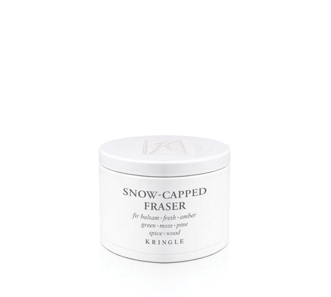 A white cylindrical tin of Kringle Snow-Capped Fraser scented wax melt, featuring black text on the front label, set against a seamless white background.