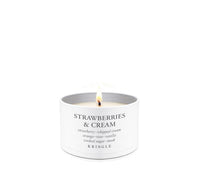 Kringle Candle Company 'Strawberries & Cream' candle tin on a white background