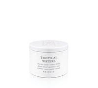 A white cylindrical metal tin of Kringle 'Tropical Waters' candle wax or candle container on a seamless white background.