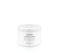 Kringle Candle tin labeled 'Warm Apple Pie' on a white background