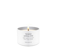 Kringle Candle tin with 'Warm Apple Pie' scent on a white background