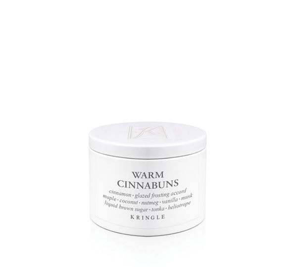 Kringle Creamery 'Warm Cinnabuns' candle tin on a white background