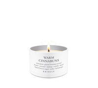 Kringle Candle tin with 'Warm Cinnabuns' description on a white background