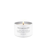 Candle tin labeled 'Watercolors' by Kringle Candle on a white background
