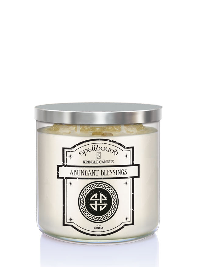 Abundant Blessings Scented Candle with a label on a white background