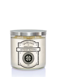 Abundant Blessings Scented Candle with a label on a white background