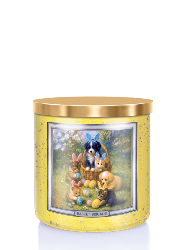 Decorative candle with a festive design featuring animals and Easter eggs on a yellow background.