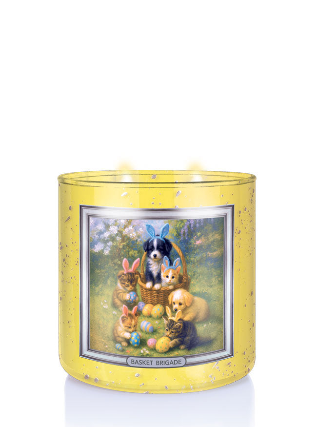Decorative candle with Easter-themed illustration of animals and eggs on a yellow background