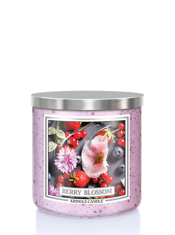 Kringle Candle Berry Blossom candle with floral and fruit design on a white background