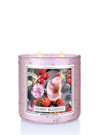 Kringle Candle Berry Blossom candle with floral and berry design on a white background