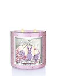 Kringle Candle Bunny Hop candle with decorative design on a white background
