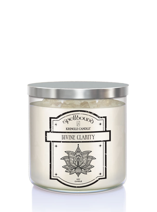 Candle with a silver lid and 'Divine Clarity' label on a white background showing front of candle