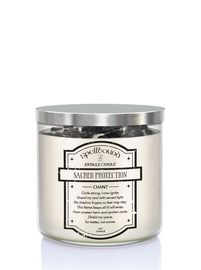 Candle labeled 'Sacred Protection' with a silver lid on a white background