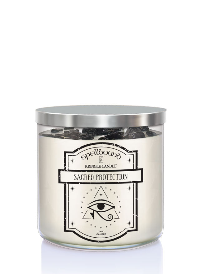 Candle with 'Sacred Protection' label on a white background