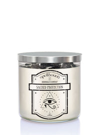 Candle with 'Sacred Protection' label on a white background
