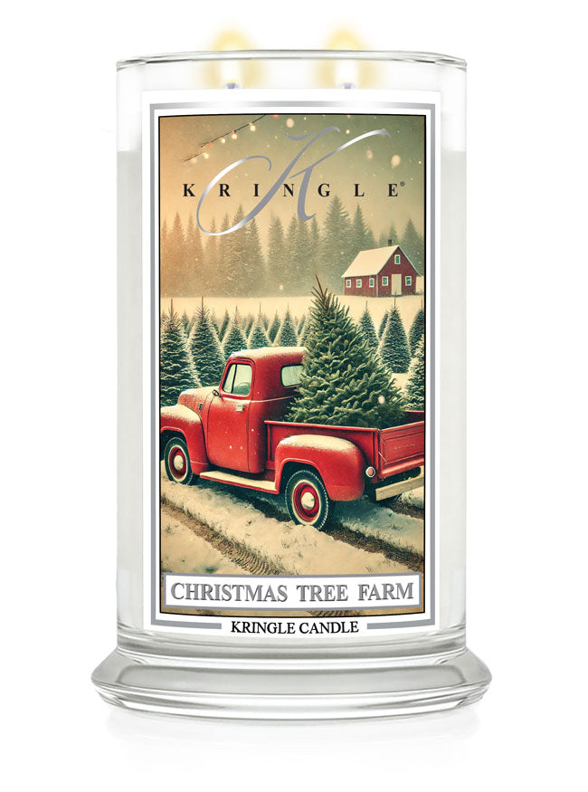 Red truck with Christmas trees on a snowy farm, Kringle Candle "Christmas Tree Farm" large jar.