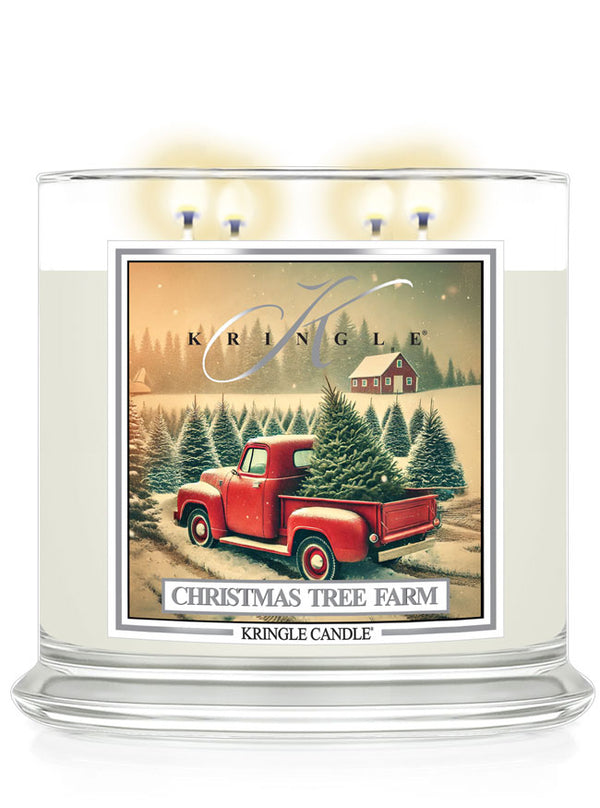 Kringle 4-Wick Candle with Christmas tree farm scene, featuring a vintage red truck and snowy landscape.