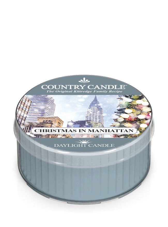 Country Candle Christmas in Manhattan daylight candle on a white background