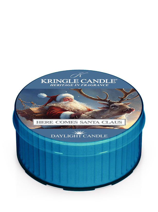 Kringle Candle daylight candle with Santa Claus and reindeer design on a white background