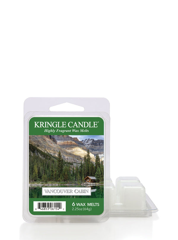 Wax melt pack "Vancouver Cabin" with a label image of a forested mountain landscape and a cabin by a lake.