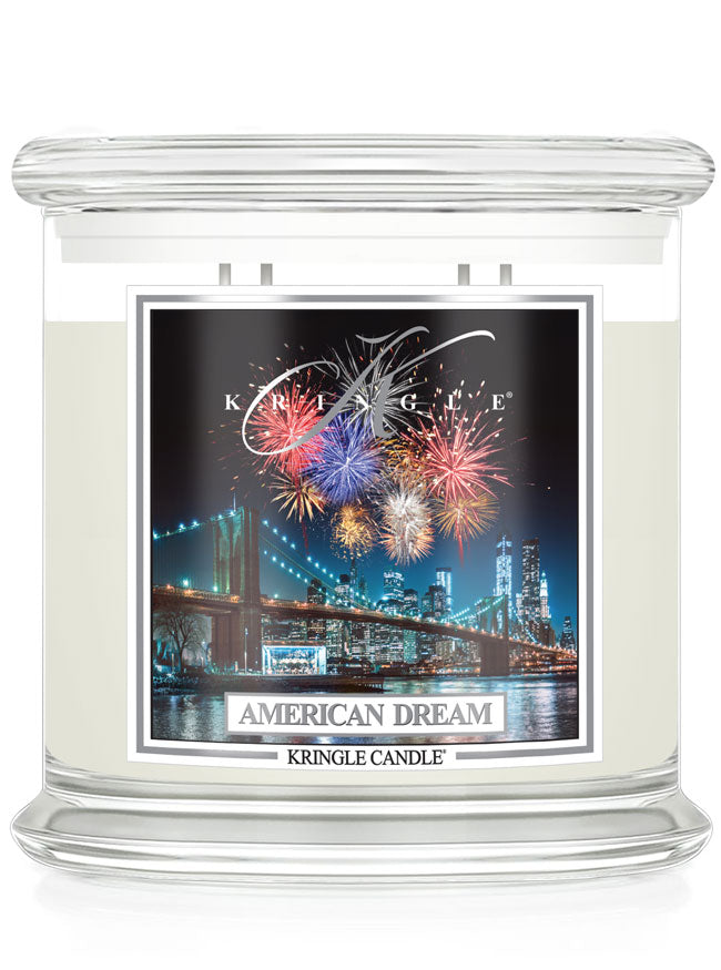 Kringle Candle 'American Dream' with fireworks and cityscape design on a white background