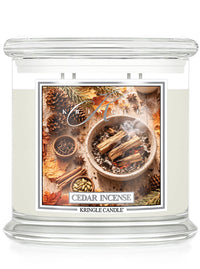 Kringle Candle Cedar Incense candle with decorative label on a white background