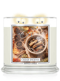 Kringle Candle Cedar Incense candle with decorative label on a white background