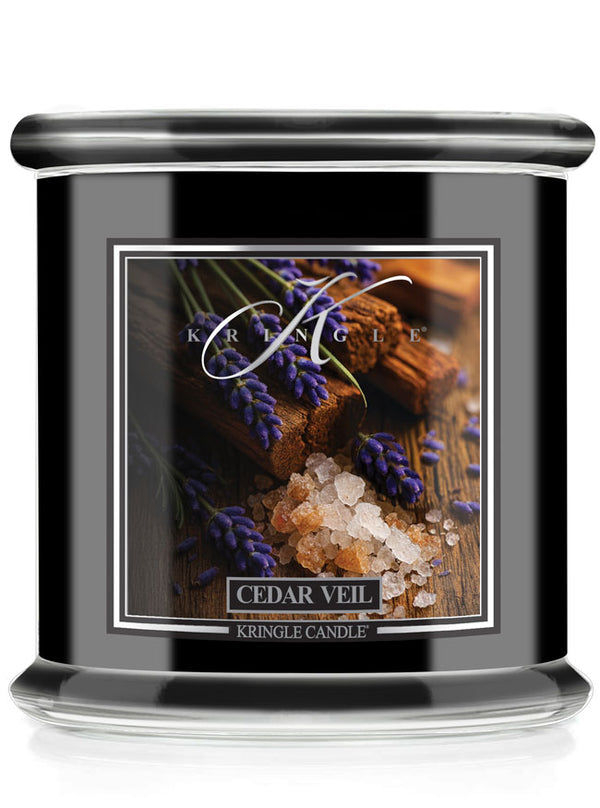 Kringle Candle Cedar Veil candle with lavender and wood design on the label