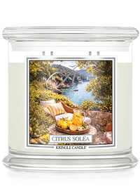 Kringle Candle Citrus Solea 4-wick candle with scenic label on a white background