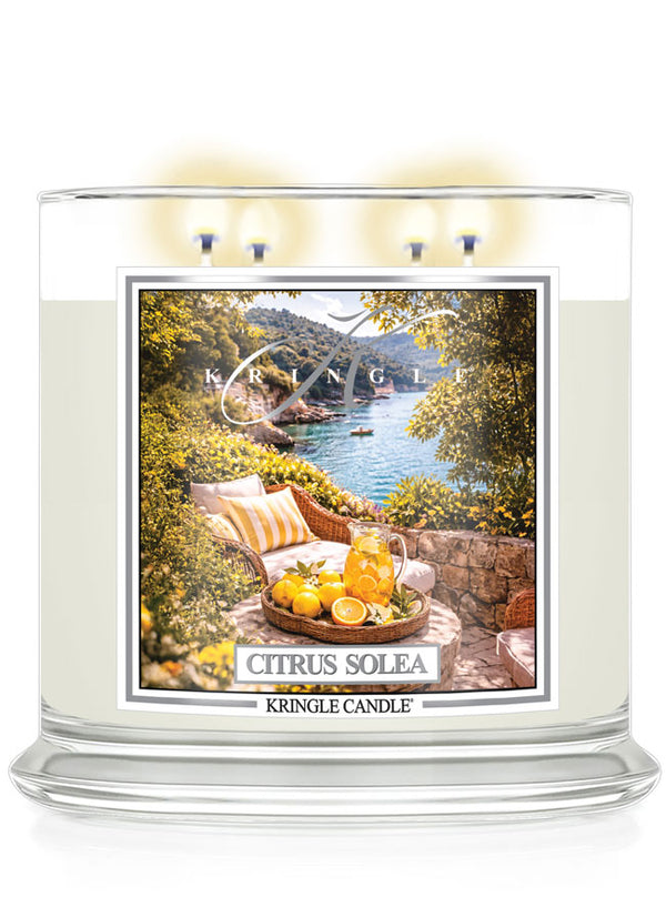 Kringle Candle Citrus Solea 4-wick candle with scenic design on a white background