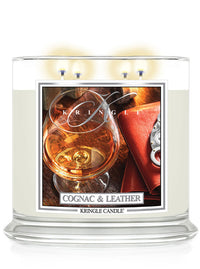 Cognac and leather scented lit 4-wick lit candle by Kringle Candle