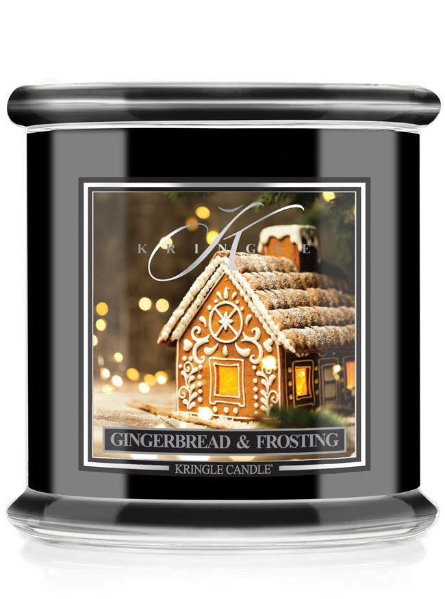 Kringle Candle gingerbread and frosting candle with a gingerbread house design on the label.