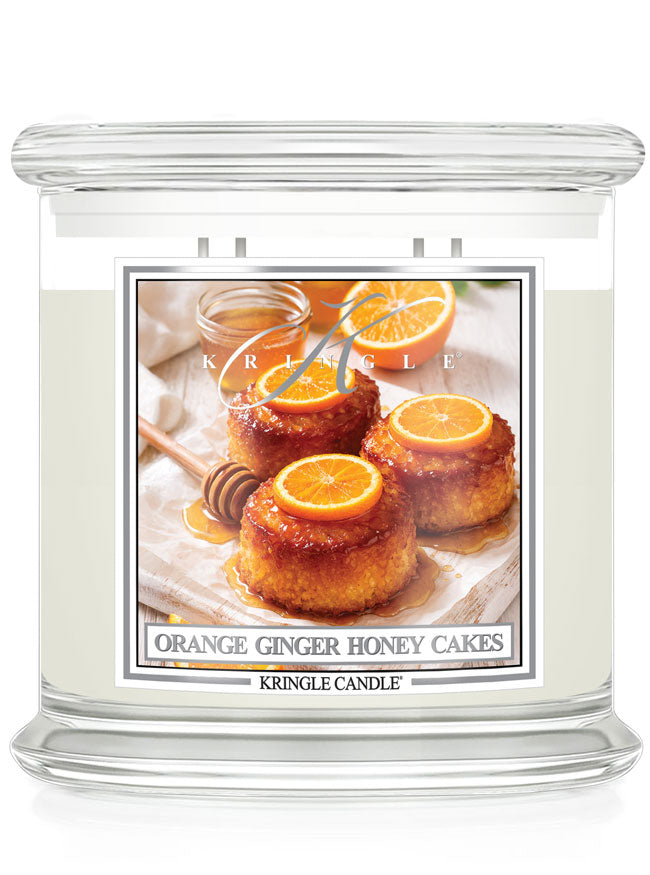 Kringle Candle with an image of orange ginger honey cakes on a white background