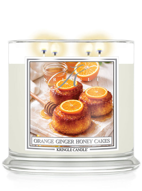 Kringle Candle with an orange ginger honey cakes design on a white background