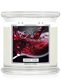 Kringle Candle Pinot Noir scented candle with a wine glass design on the label.
