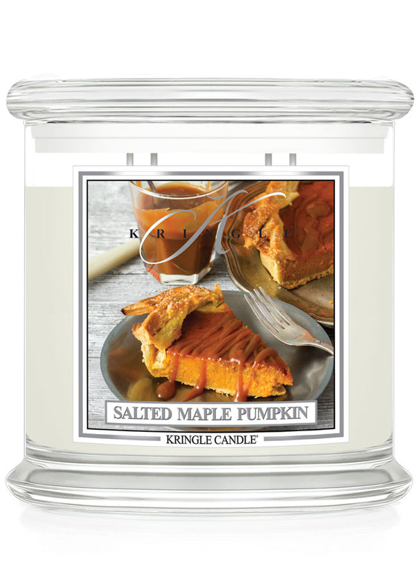 Kringle Candle 4-wick salted maple pumpkin scented candle with pie illustration on a white background