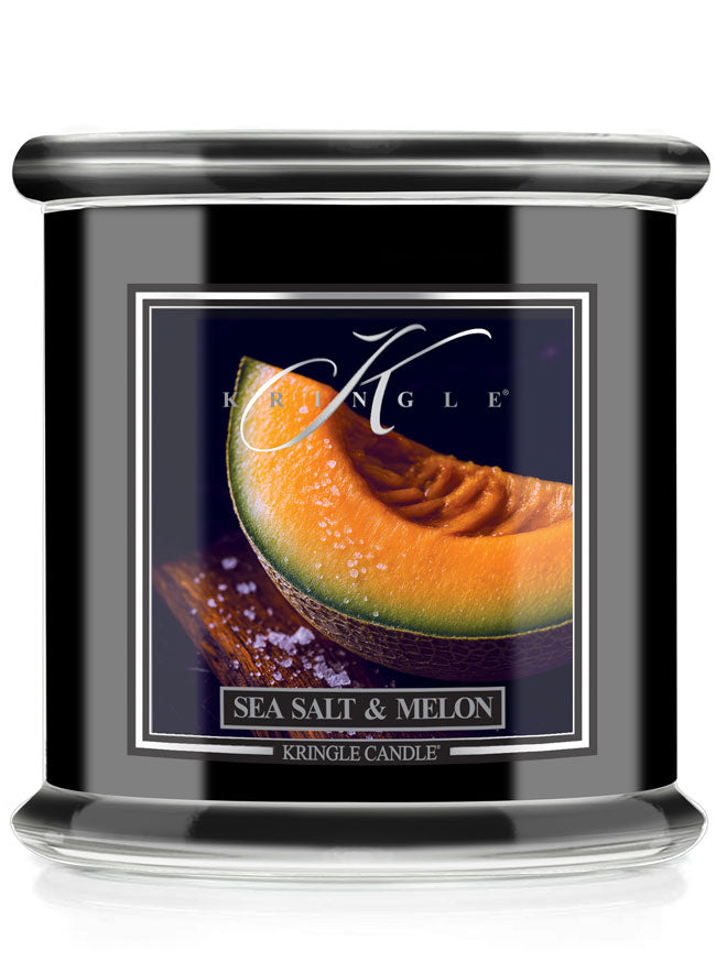 Kringle Candle with sea salt and melon scent on black reserve jar 