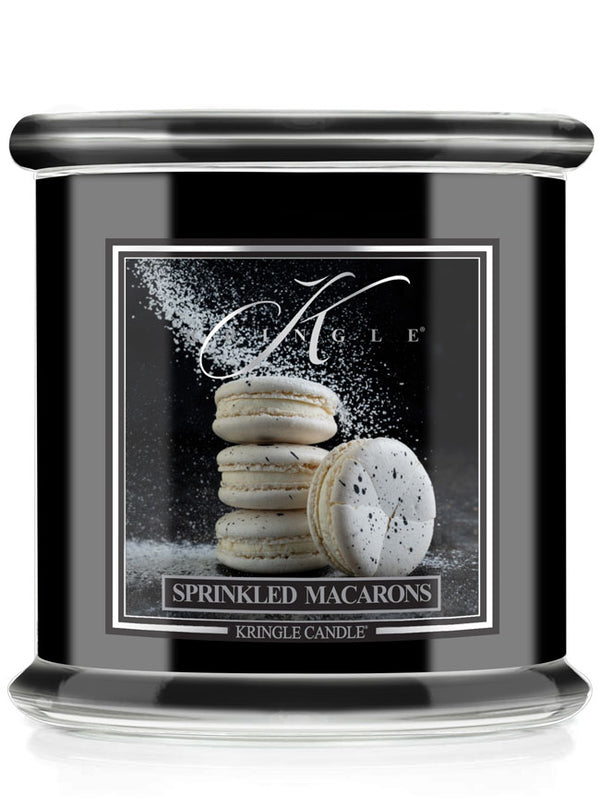 Kringle Candle with 'Sprinkled Macarons' design on a black background
