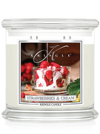 Kringle Candle with 'Strawberries & Cream' flavor packaging on a white background