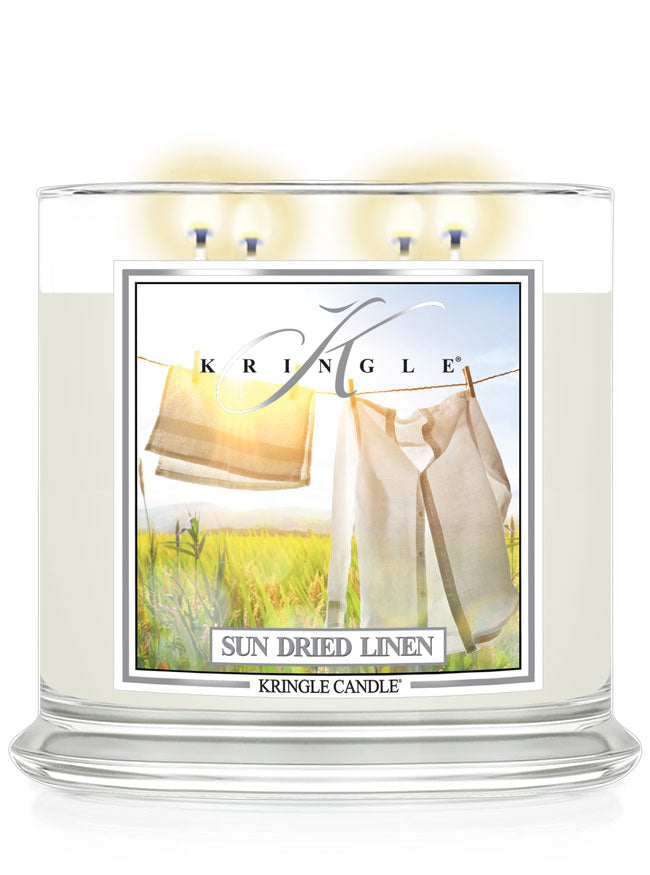 Kringle Candle with 'Sun Dried Linen' packaging on a white background