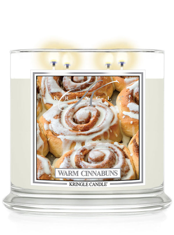 Kringle Candle Warm Cinnabuns 4-wick candle with 'Warm Cinnabuns' packaging on a white background