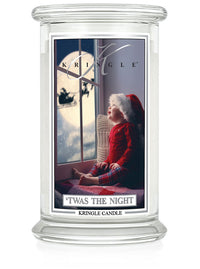 Kringle Candle with a child by a window design on a white background