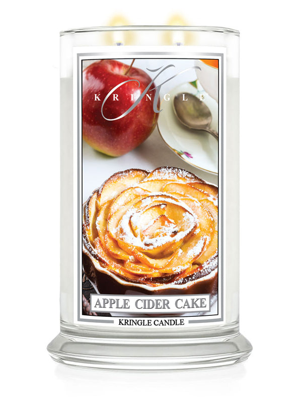 Kringle Candle Apple Cider Cake scented candle with a decorative label.